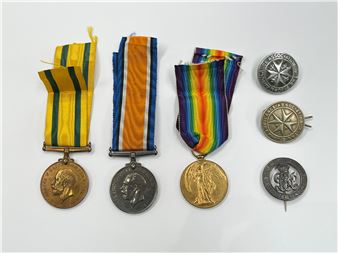 A WWI pair of medals named to A. SJT. H.S. BATES R.E., together with a Territorial Force War Medal named to SPR. Two St John's Ambulance badges and a Wound Badge - Bates