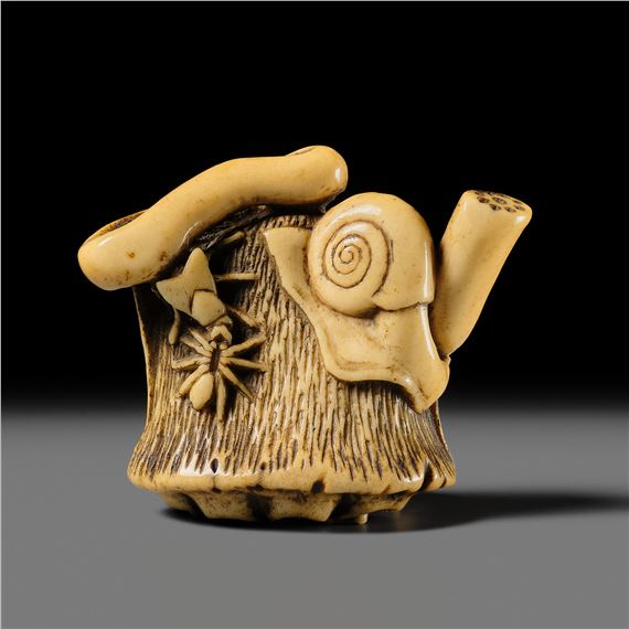 ITTEI: AN ANTLER (TRICK) NETSUKE OF A LOTUS POD WITH THE MAKINO CLAN MON - Hizen Matsura Ittei
