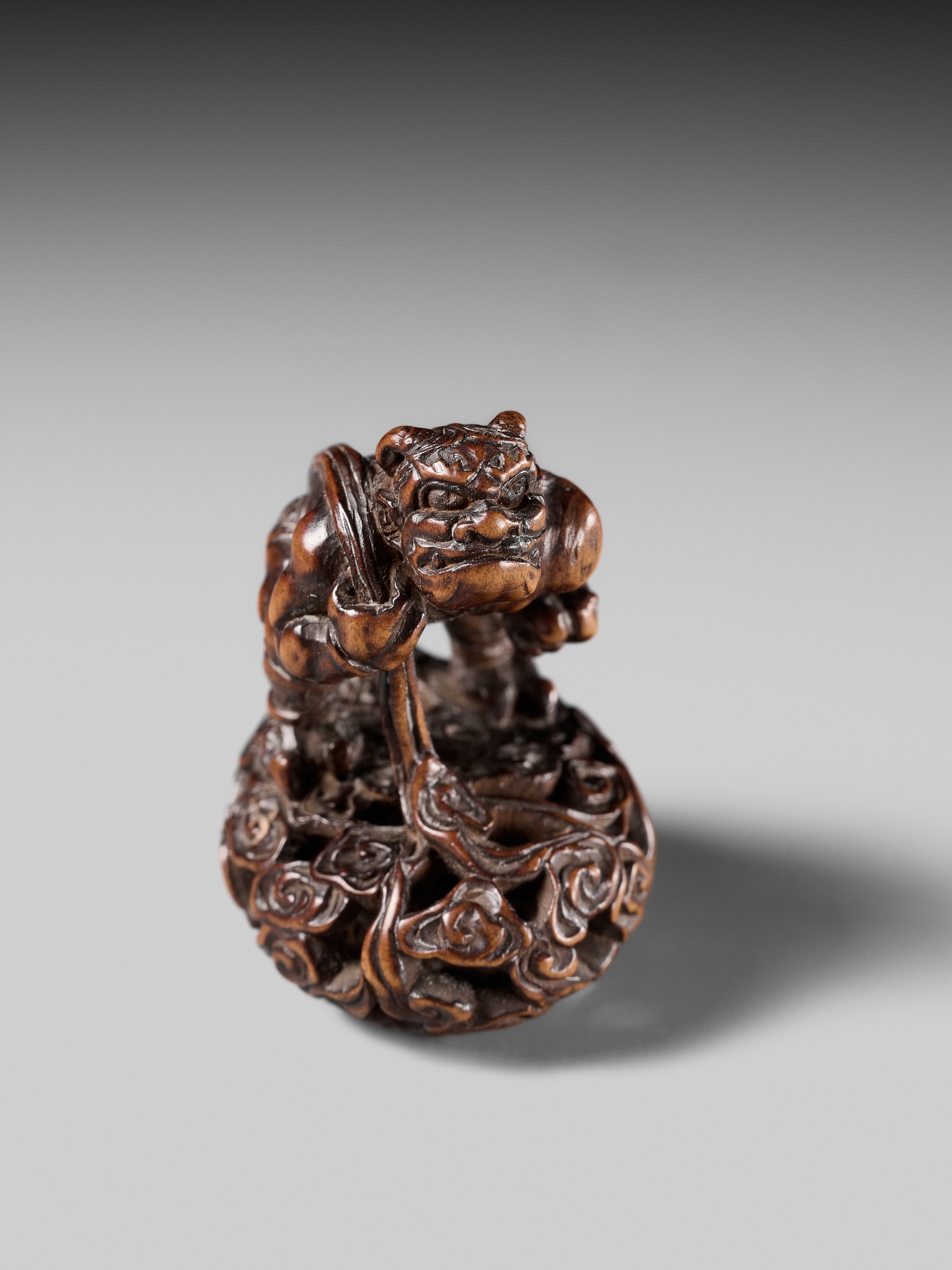 Shojusai | SHOJUSAI: A FINE WOOD NETSUKE OF FUJIN | MutualArt