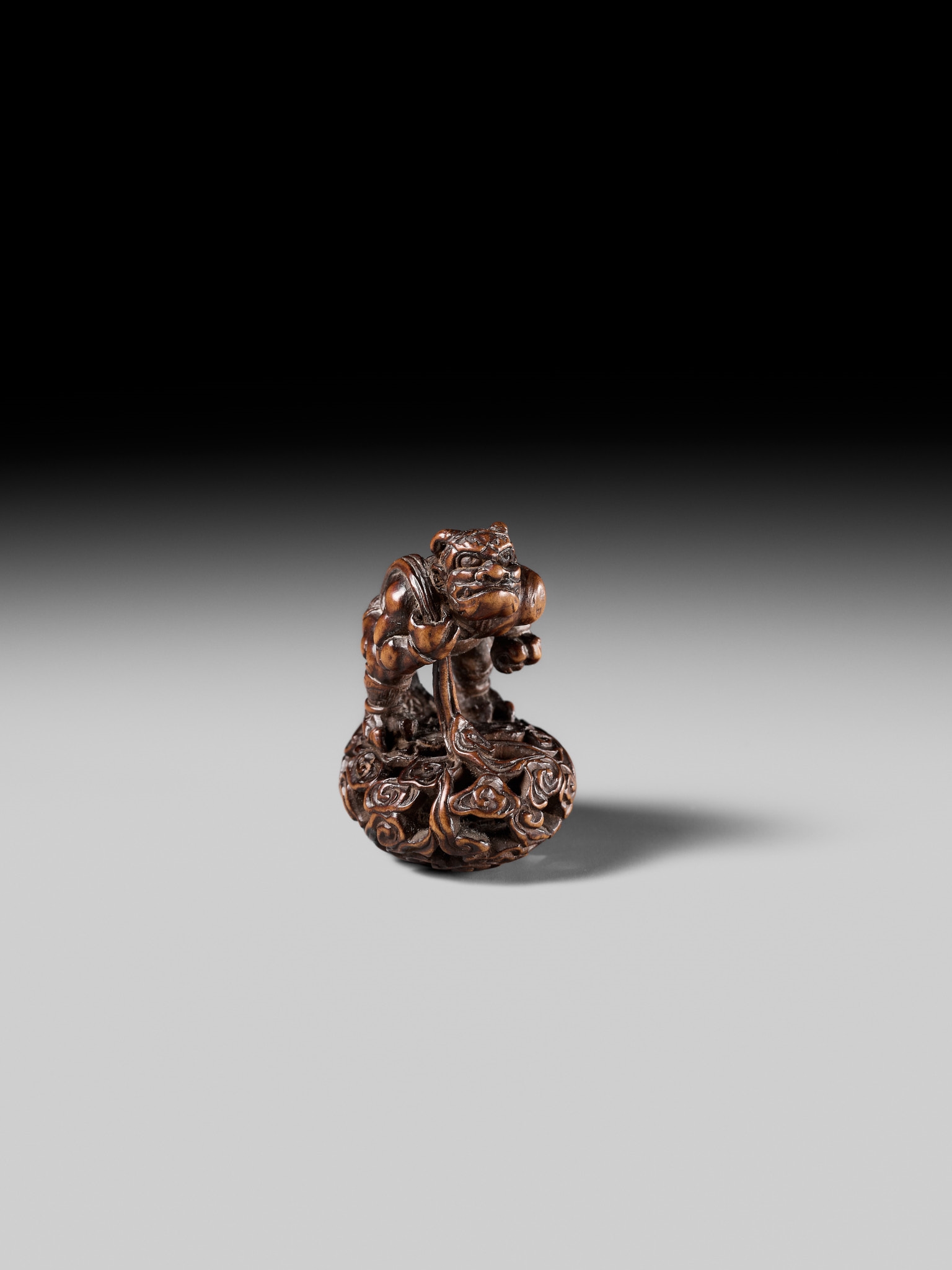 Shojusai | SHOJUSAI: A FINE WOOD NETSUKE OF FUJIN | MutualArt