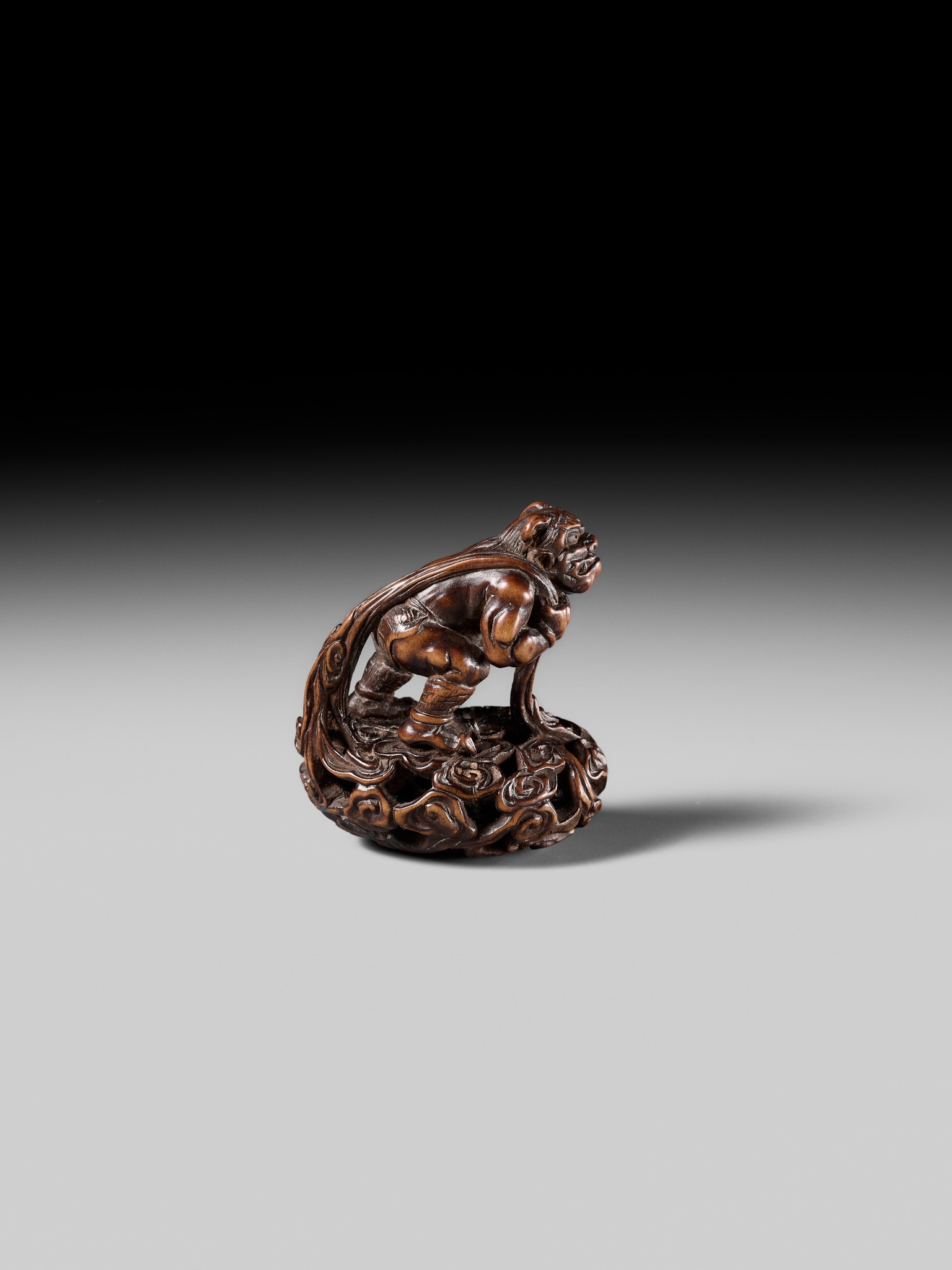 Shojusai | SHOJUSAI: A FINE WOOD NETSUKE OF FUJIN | MutualArt