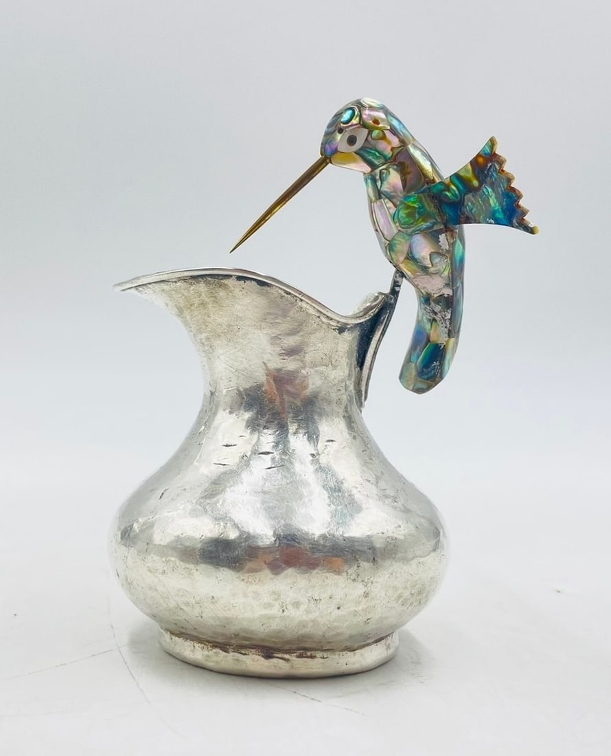 Artwork by Los Castillo, Creamer Pitcher With a Hummingbird Handle in Silver & Abalone by Los Castillo, Made of Brass