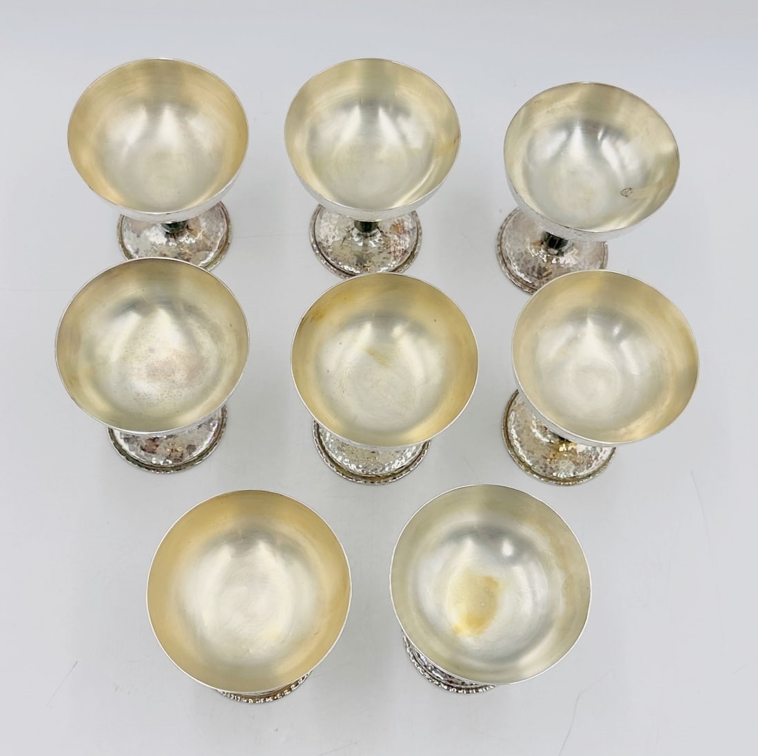 Artwork by Los Castillo, Set of 8 Hammered Silver & Inlaid Malachite Water/Wine Glasses by Los Castillo, Mexico 20th Century, Made of hammered silver and inlaid malachite stone