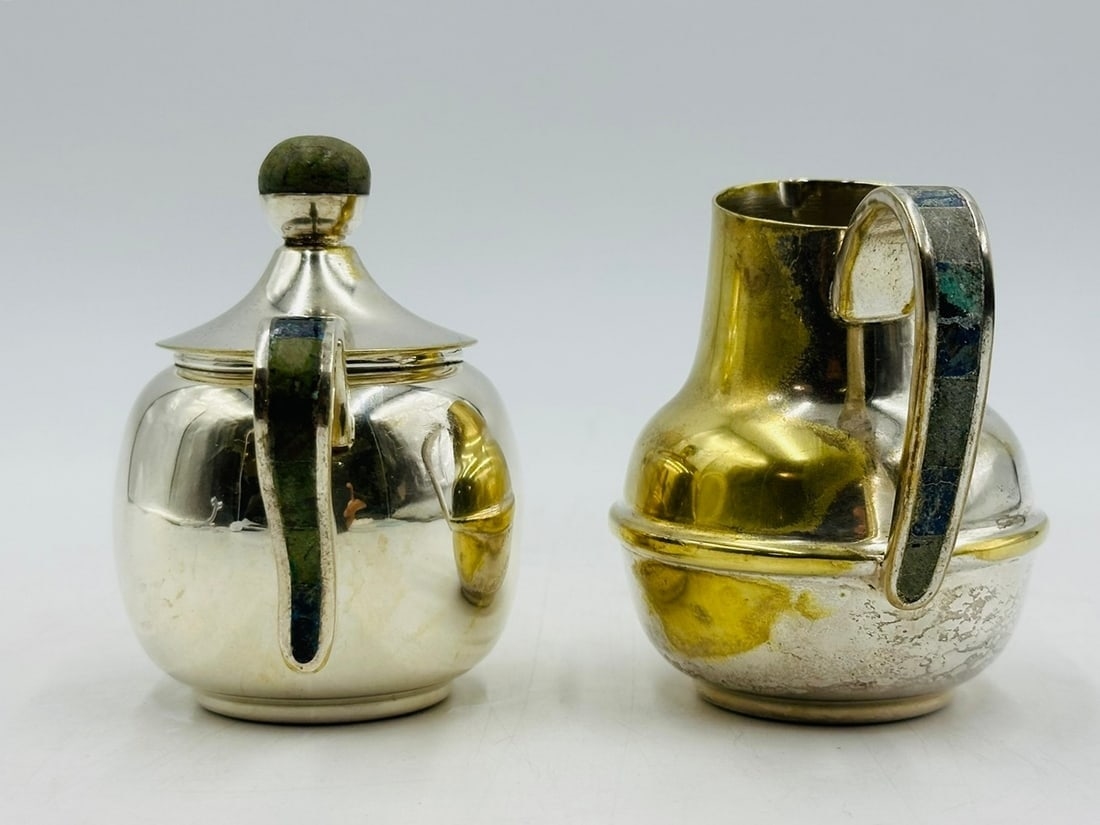 Artwork by Los Castillo, Los Castillo Creamer & Sugar Pot, Silver With Stone Inlay, Mexico 20th Century, Signed, Made of Brass