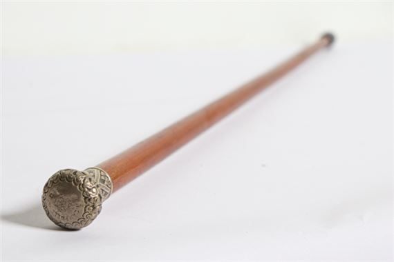 Unknown | A vintage silver tone capped walking stick with repousse ...