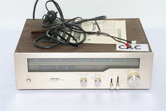 A Rotel AM/FM stereo tuner RT62-4L with owners manual