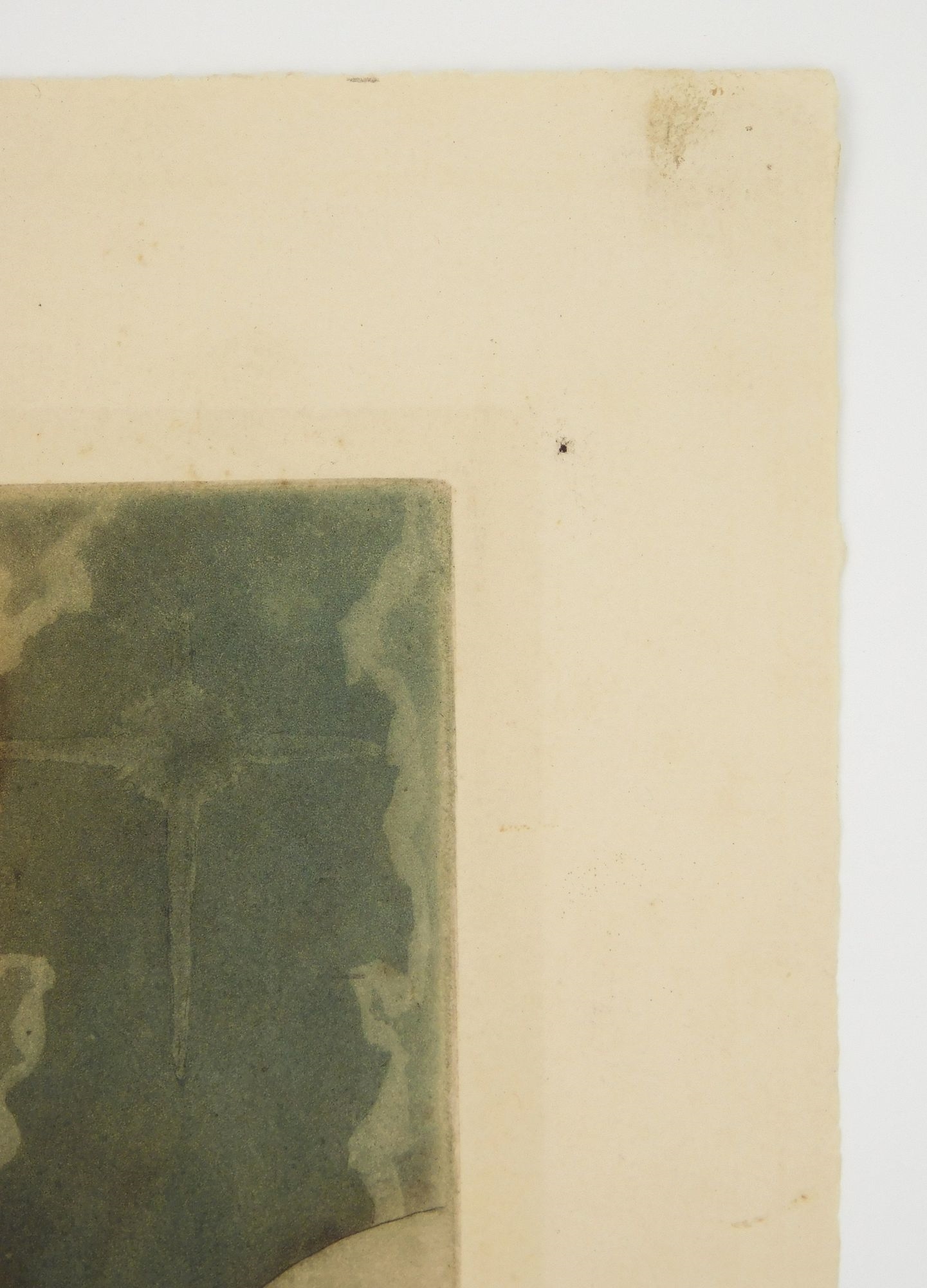 A muted-toned watercolor scene of two hooded figures in prayer.