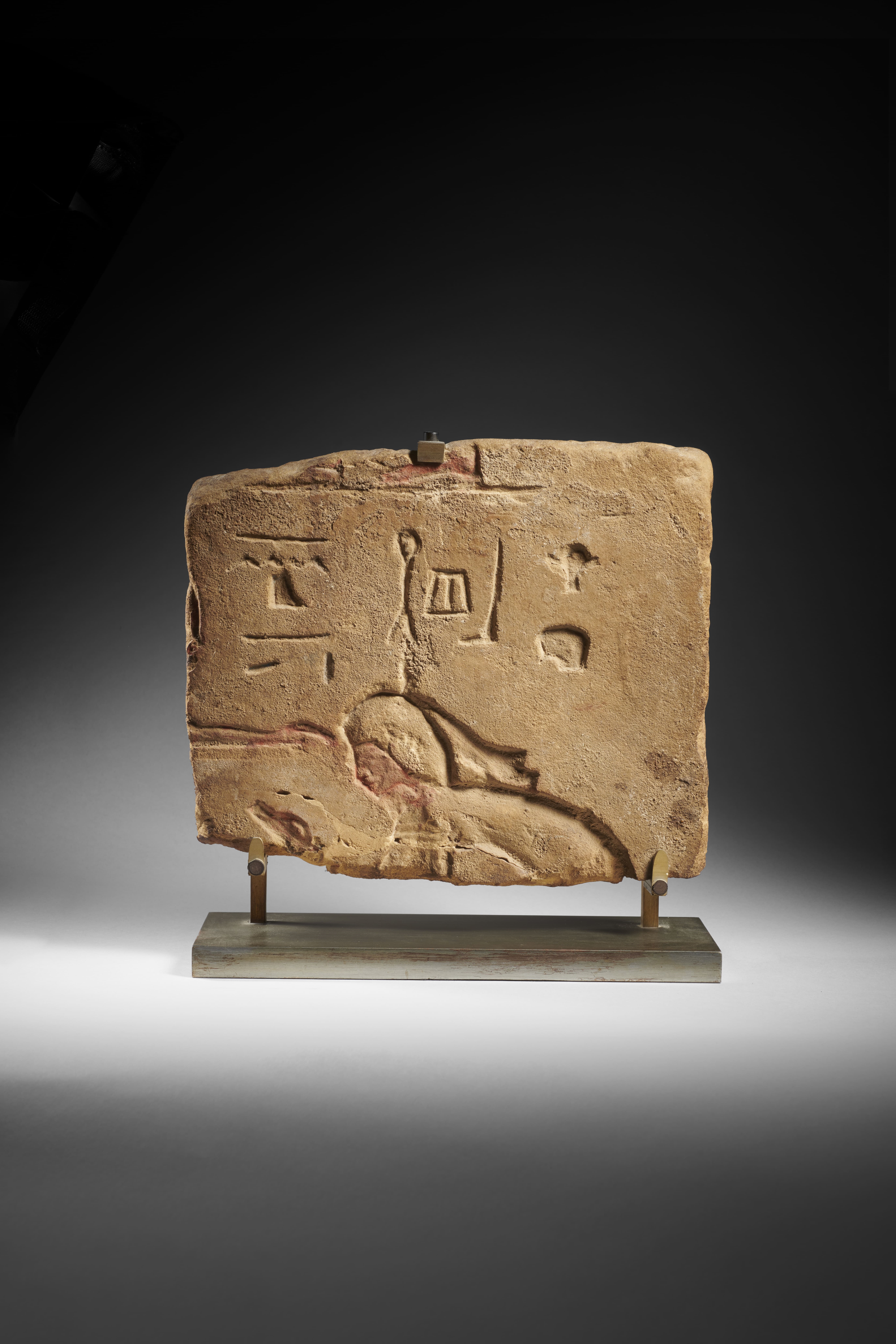 Michel | An Egyptian sandstone fragmentary talatat relief | MutualArt