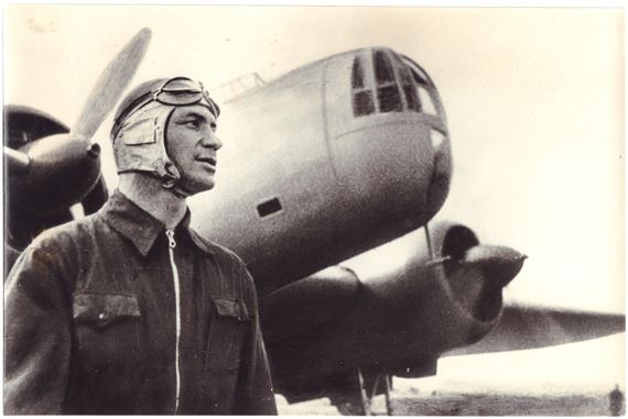 Pilot, twice Hero of the Soviet Union Vladimir Konstantinovich Kokkinaki in 1939 near the Moskva airplane
