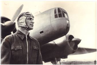 Pilot, twice Hero of the Soviet Union Vladimir Konstantinovich Kokkinaki in 1939 near the Moskva airplane - Boris Evgenievich Vdovenko