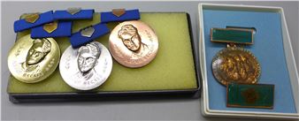 Three East German Arthur Becker Socialist medals and one oth - Adolf von Becker