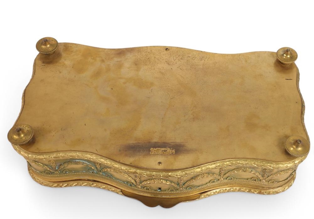 Rubbing | A French porcelain mounted gilt metal table box (Early 20th ...