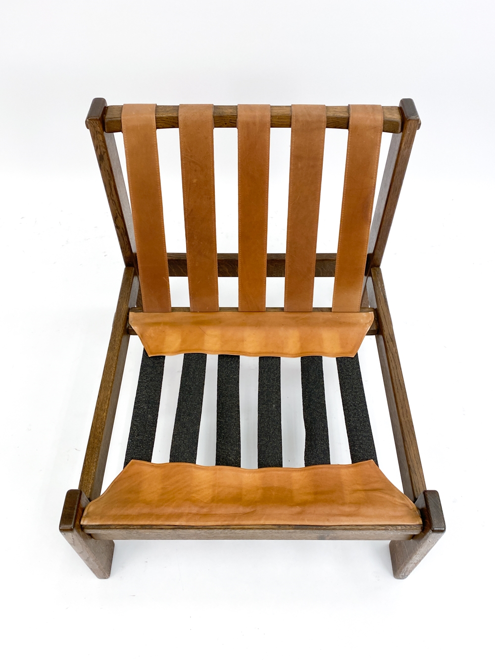 Carl Straub | Solid oak brutalist form bases with tan leather ...