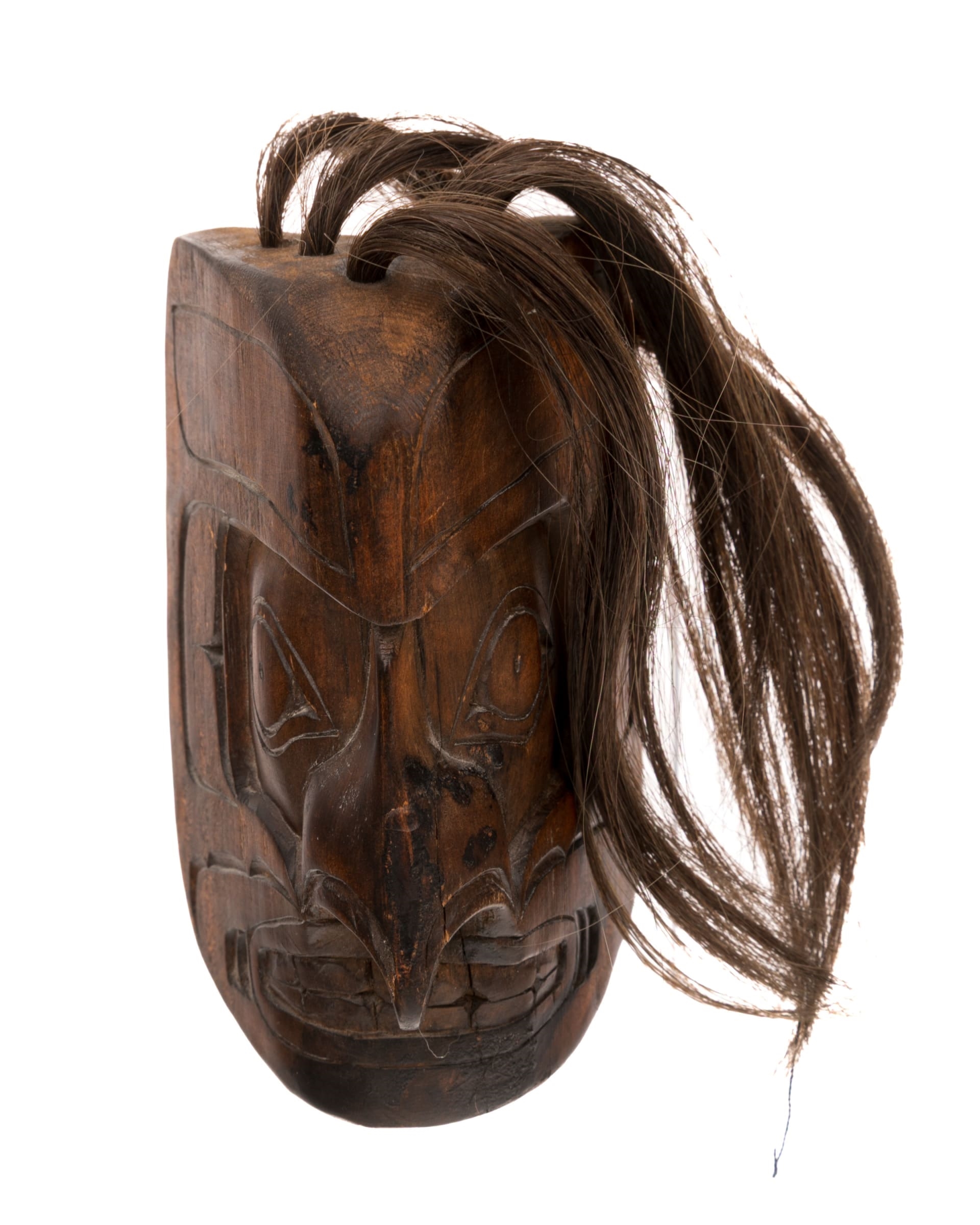Artwork by Danny Matilpi, Mask, Made of cedar wood, stain, and hair