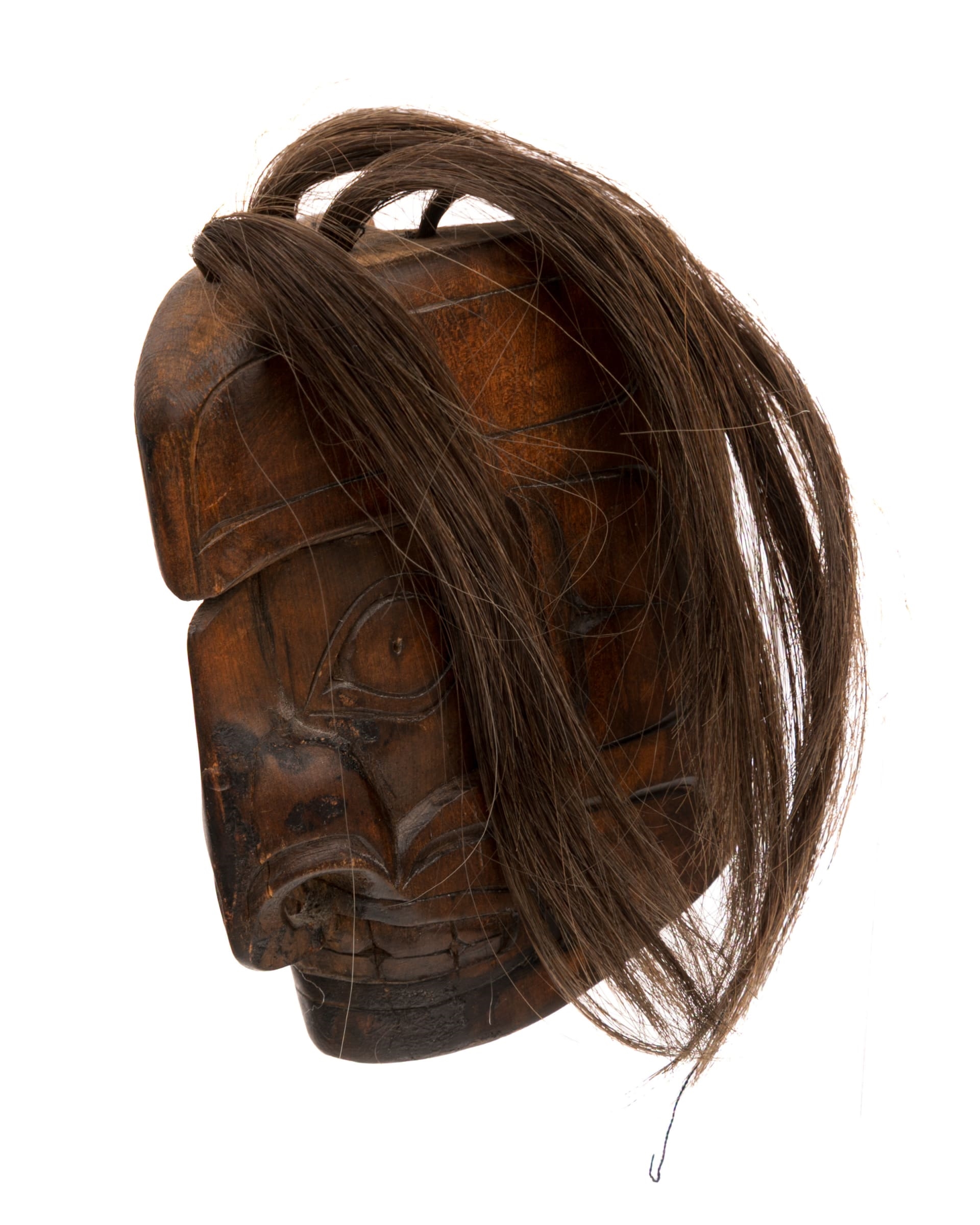Artwork by Danny Matilpi, Mask, Made of cedar wood, stain, and hair