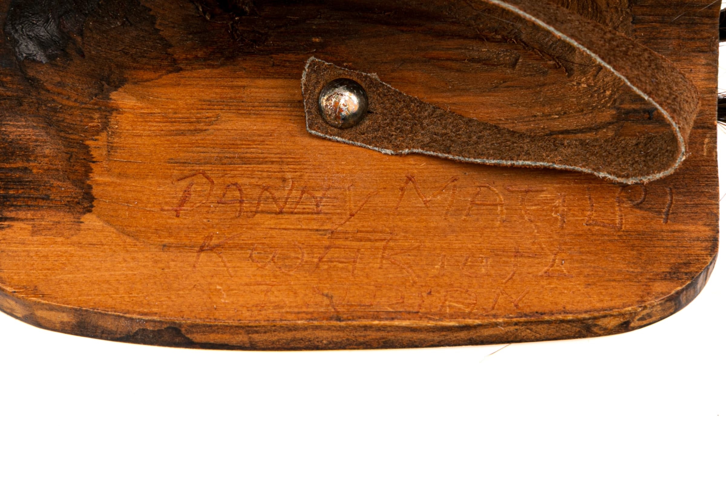 Artwork by Danny Matilpi, Mask, Made of cedar wood, stain, and hair