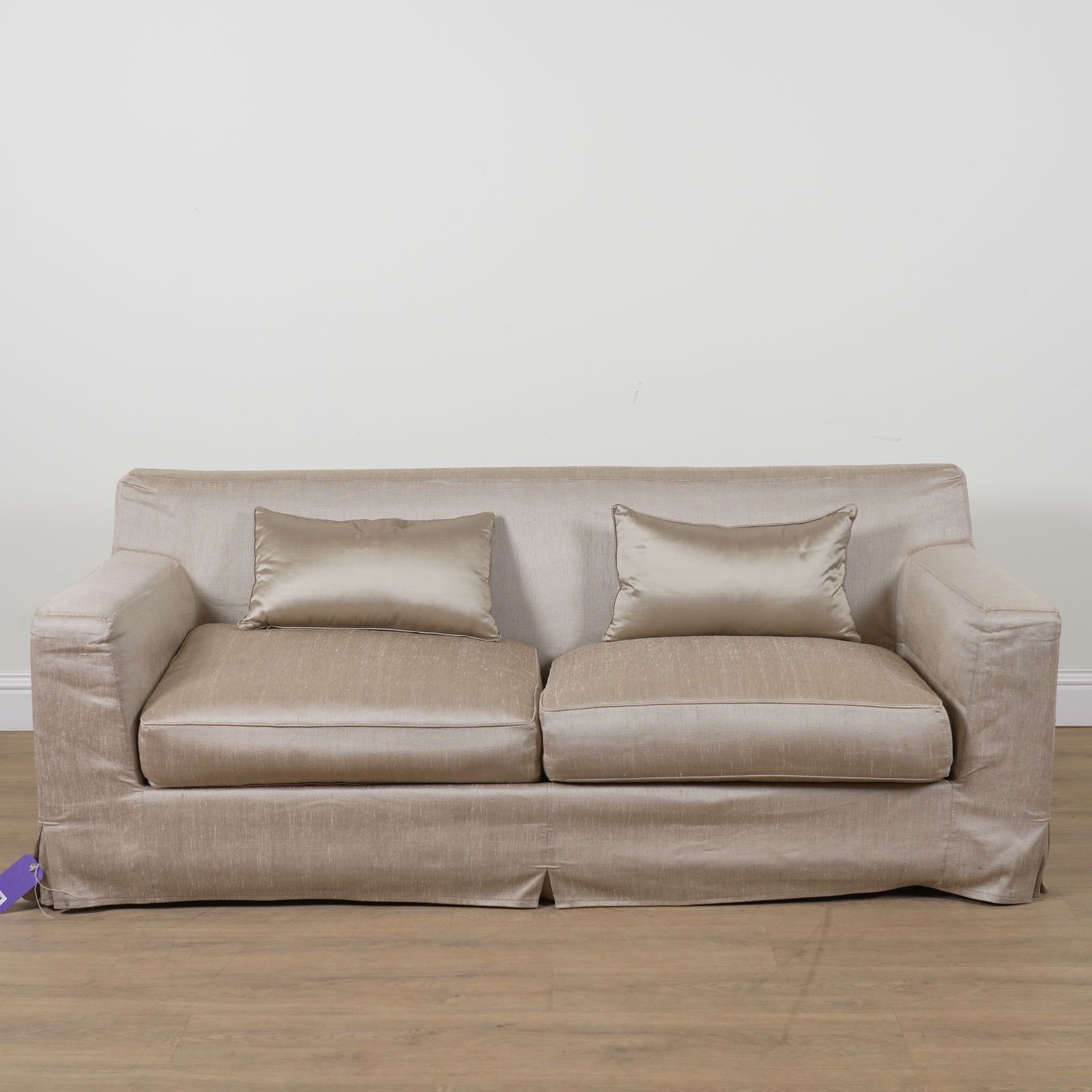 Artwork by Christian Liaigre, CHRISTIAN LIAIGRE; A GOLD UPHOLSTERED SQUARE BACK TWO SEAT SOFA