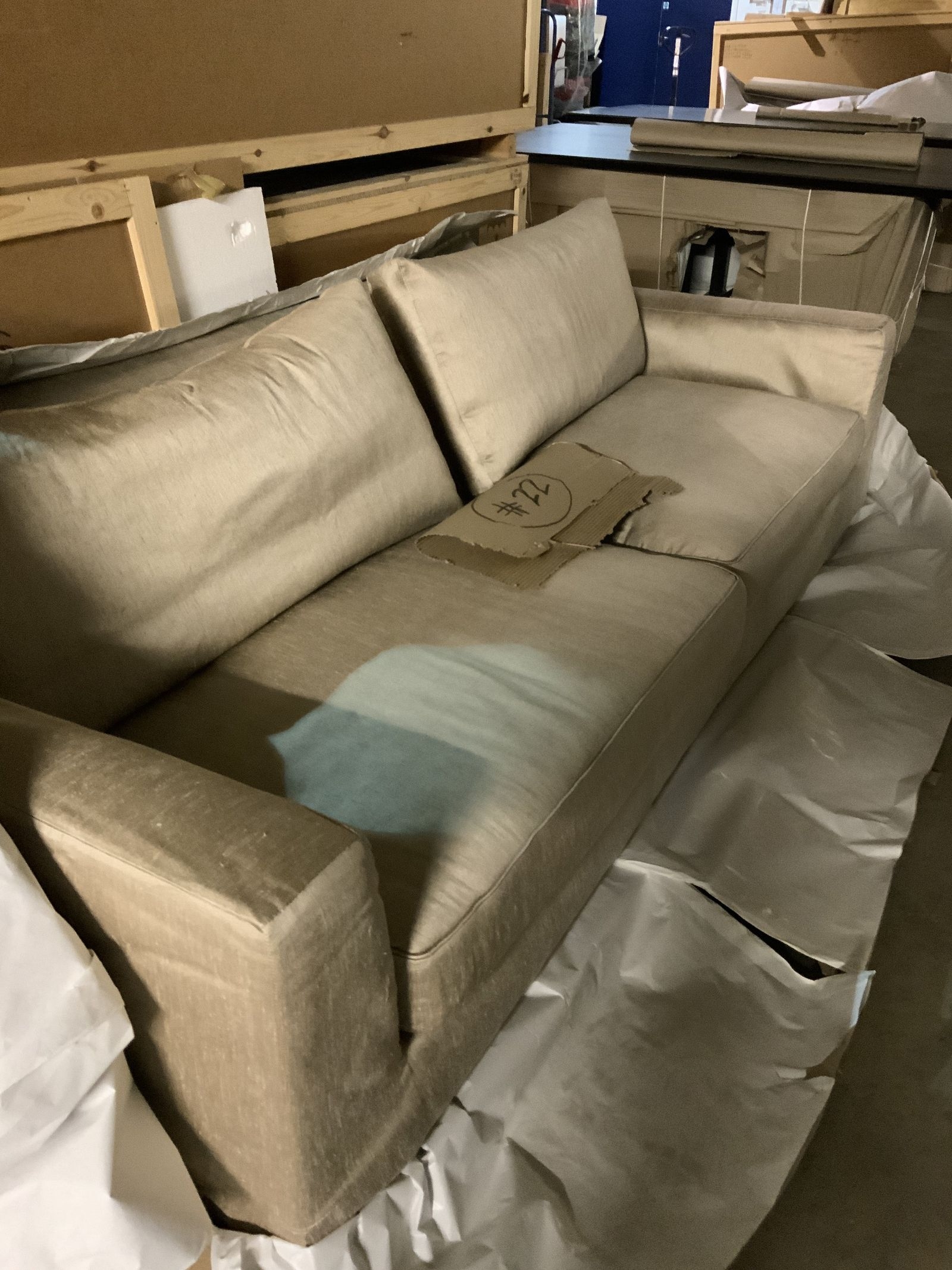 Artwork by Christian Liaigre, CHRISTIAN LIAIGRE; A GOLD UPHOLSTERED SQUARE BACK TWO SEAT SOFA