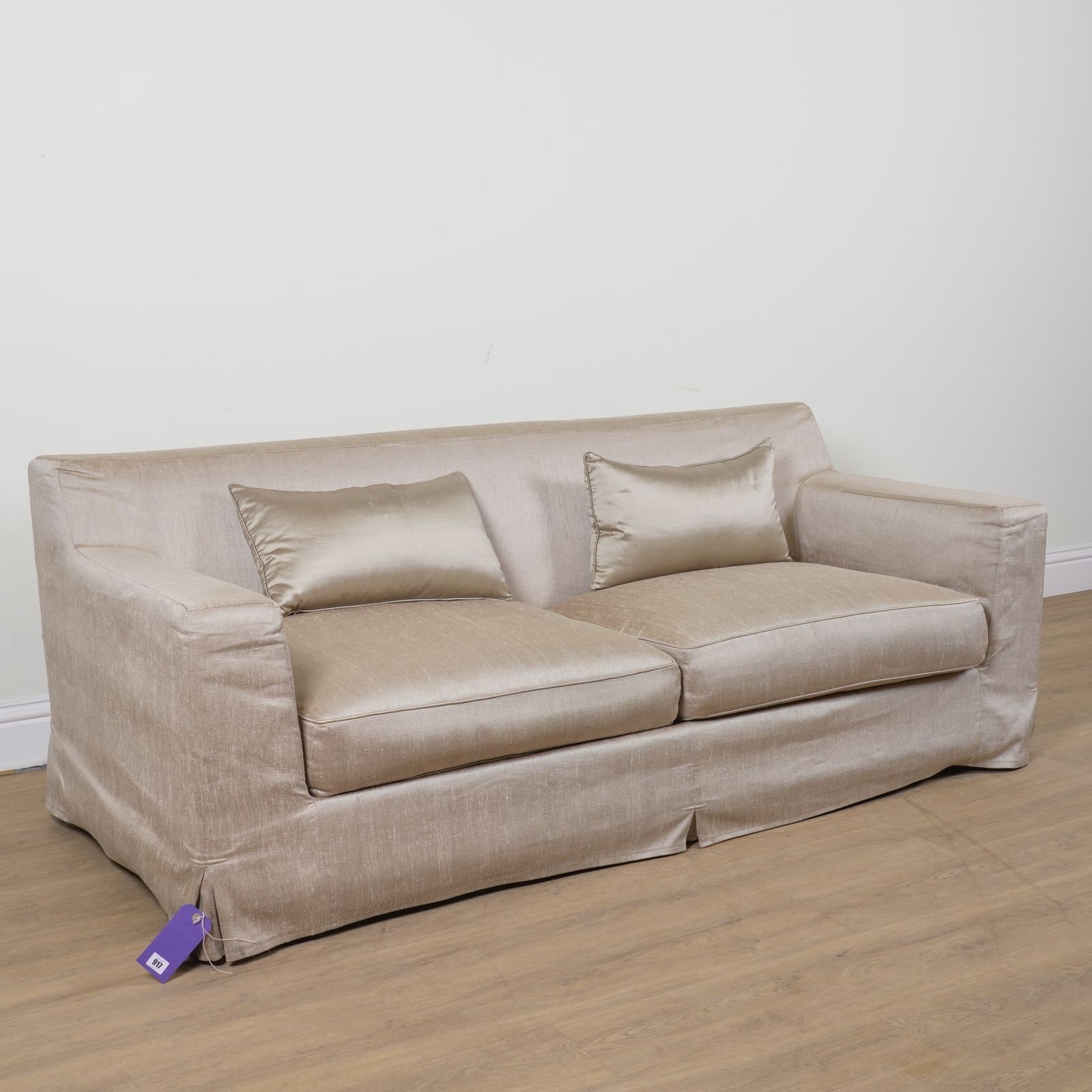 Artwork by Christian Liaigre, CHRISTIAN LIAIGRE; A GOLD UPHOLSTERED SQUARE BACK TWO SEAT SOFA