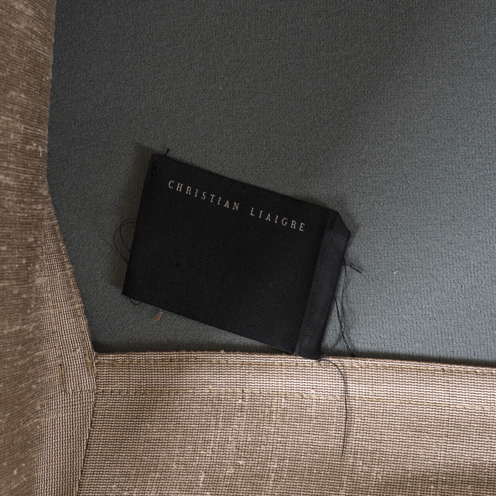 Artwork by Christian Liaigre, CHRISTIAN LIAIGRE; A GOLD UPHOLSTERED SQUARE BACK TWO SEAT SOFA