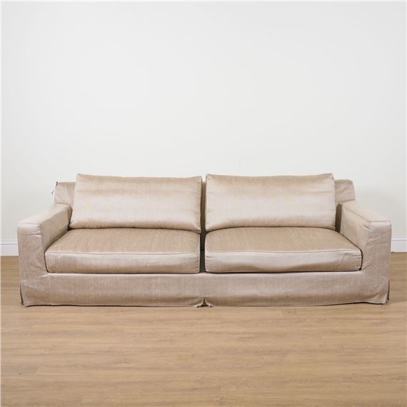 CHRISTIAN LIAIGRE; A GOLD UPHOLSTERED SQUARE BACK SOFA by Christian Liaigre