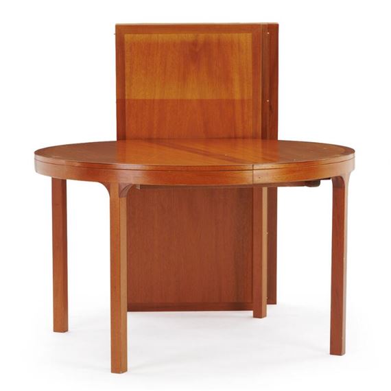 Niels Roth Andersen | Circular mahogany dining table with extension and ...