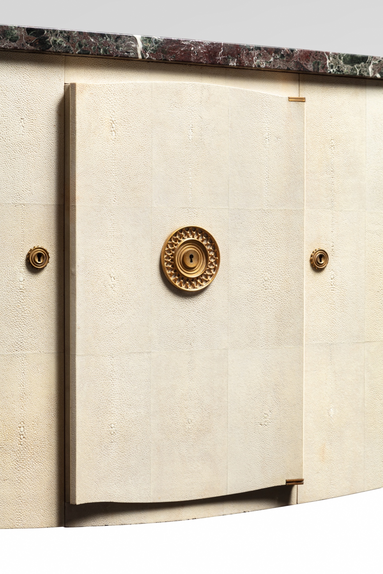 Artwork by Jules Leleu, Cabinet, Made of Oak covered in shagreen, Rosso Levante marble, gilt bronze, brass, sycamore and mahogany
