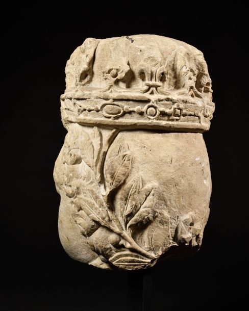 Artwork by Simon Guillain, LARGE HEAD OF A LOUIS XIII CHILD IN CARVED THUNDERBOLT LIMESTONE. Framed by a fleur-de-lys crown, Made of Carved thunderbolt limestone