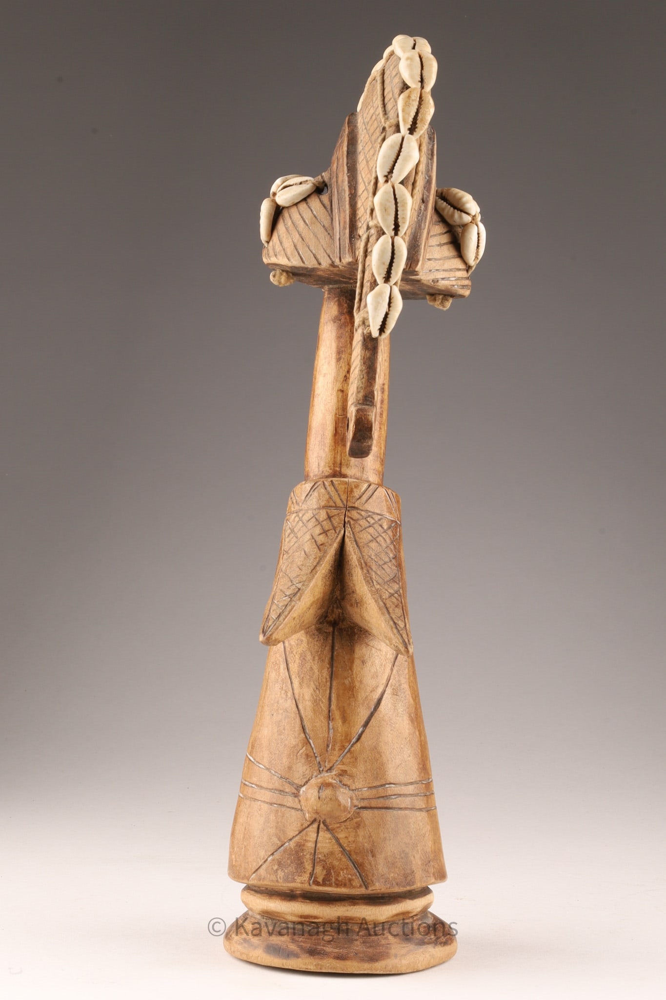 Prior | African Senufo Ancestor Figure with Cowrie Shells | MutualArt