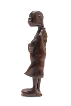 Artwork by George Ramagaga, Pregnant Figure, Made of carved wood