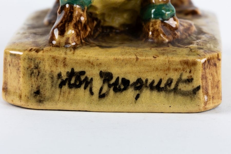 Artwork by Gaston Broquet, The load  group Manufacture Henriot Quimper, Made of Polychrome glazed earthenware