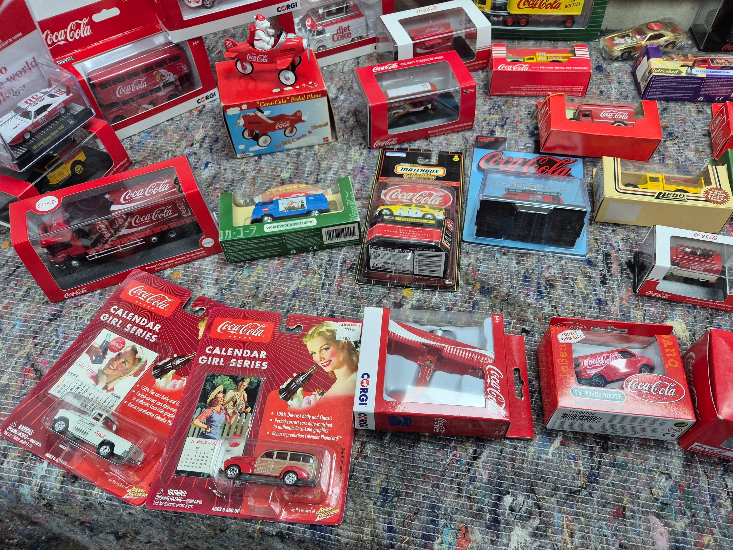 Coca Cola | A Collection of mostly Sealed Coca Cola Vehicles | MutualArt