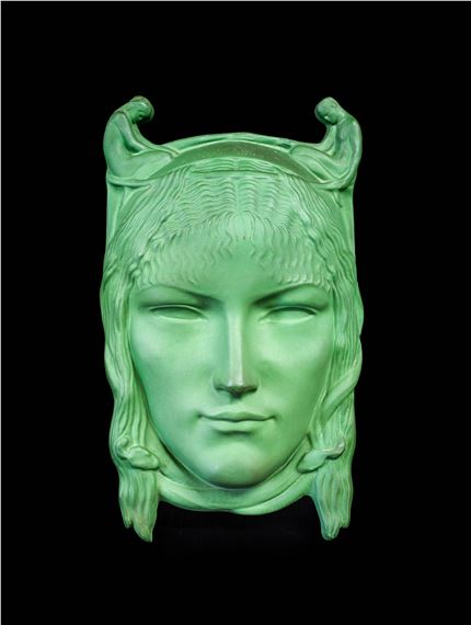 Richard (Louis) Garbe RA FRBS (1876-1957) for Doulton & Co., "Fate" circa 1921, modelled as the head of a female, her hair entwined with serpents, flanked by two miniature kneeling nudes, matt green glaze, green painted 'Fate'. by  Edition Limited to 100 ..No.58.. , ..G.. impressed 848 , modelled RICHARD GARBE 1921 across the top of the head,27cm long - Richard Garbe