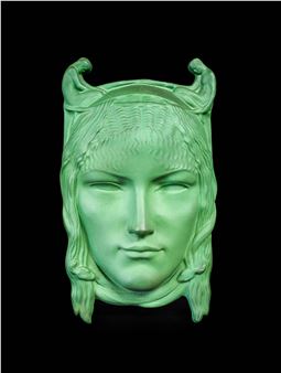 Richard (Louis) Garbe RA FRBS (1876-1957) for Doulton & Co., &quot;Fate&quot; circa 1921, modelled as the head of a female, her hair entwined with serpents, flanked by two miniature kneeling nudes, matt green glaze, green painted 'Fate'. by  Edition Limited to 100 ..No.58.. , ..G.. impressed 848 , modelled RICHARD GARBE 1921 across the top of the head,27cm long - Richard Garbe