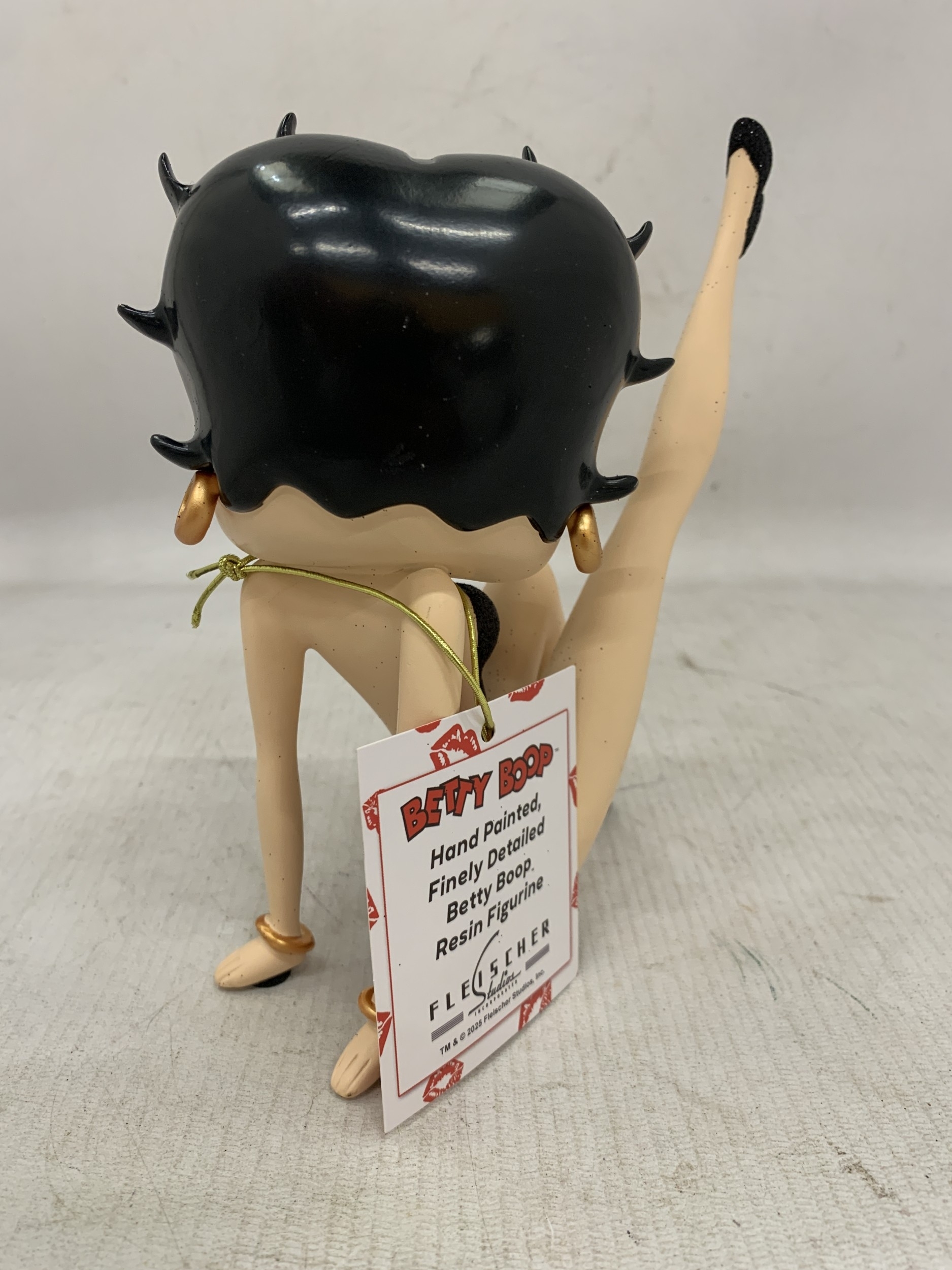 Artwork by Betty, A BETTY BOOP FIGURE WEARING A BLACK GLITTER DRESS, Made of BLACK GLITTER