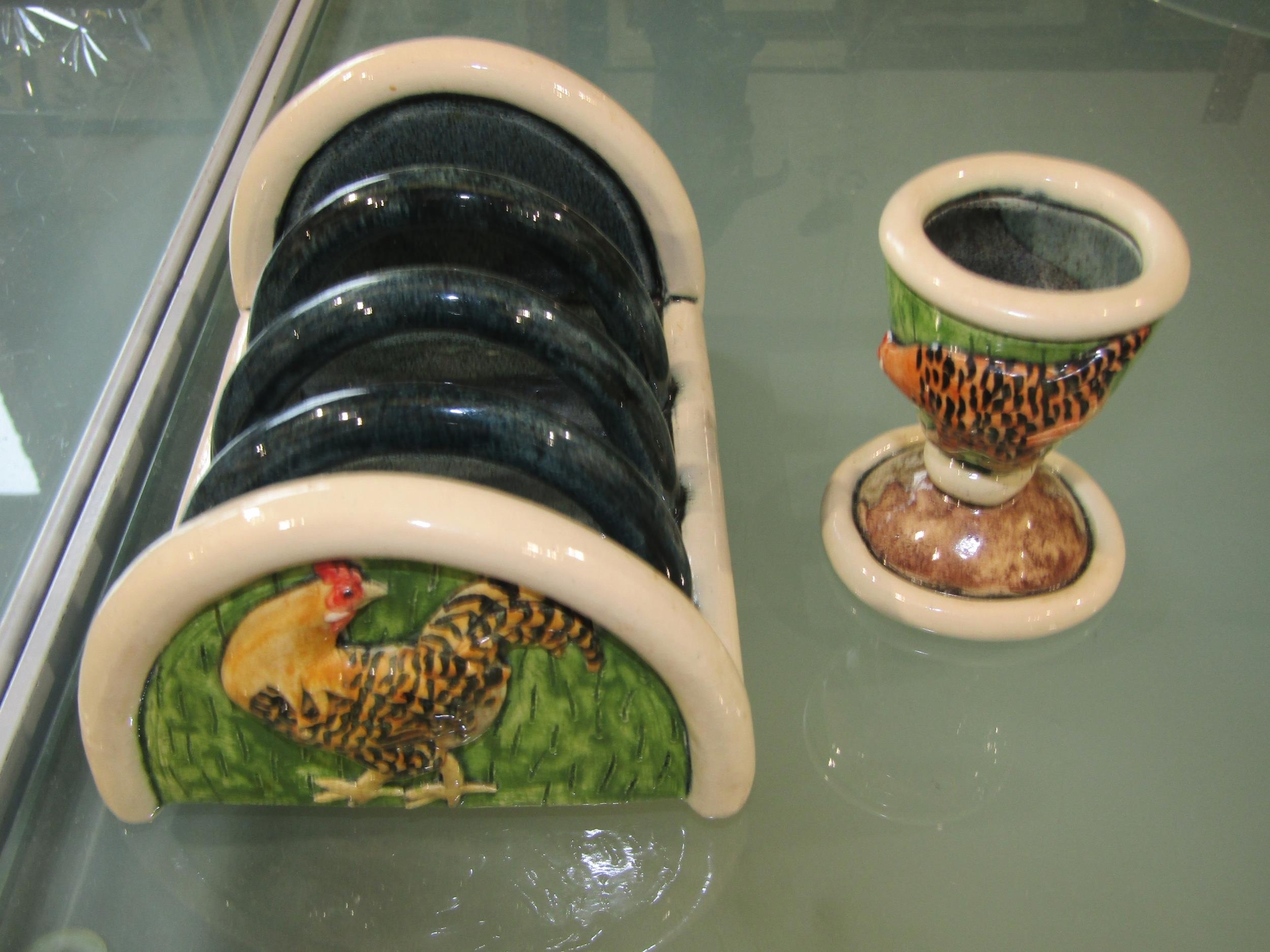 Anna Lambert | Studio toast rack and egg cup, both decorated with ...