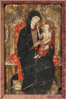 A cracked religious painting of a seated figure holding a child, framed in wood.