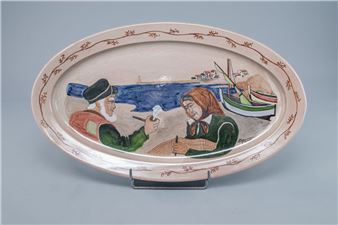 Raymond CAMART (1908-1980) - Plat ovale en faïence émaillée à décor de marins dans un paysage maritime - Ray Camart