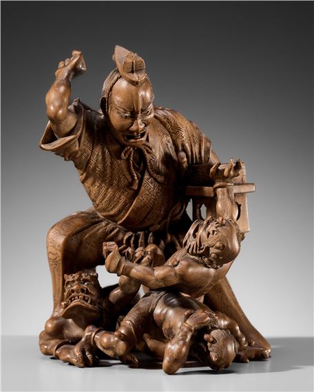 HOKYUDO ITSUMIN: A FINE WOOD OKIMONO OF A PRIEST PELTING ONI WITH BEANS - Hokyudo Itsumin