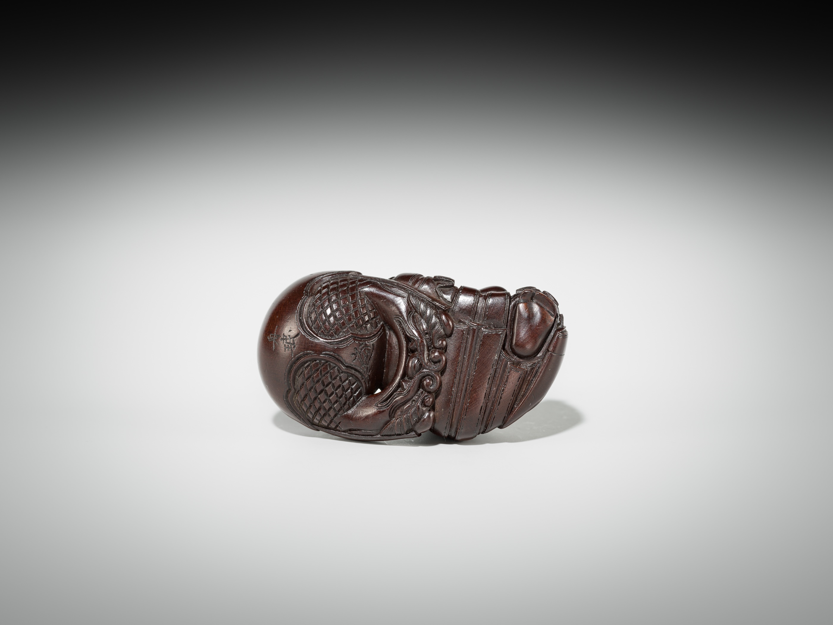 Artwork by Shûmin, SHUMIN: A FINE WOOD NETSUKE OF A MONK WITH MOKUGYO, Made of wood