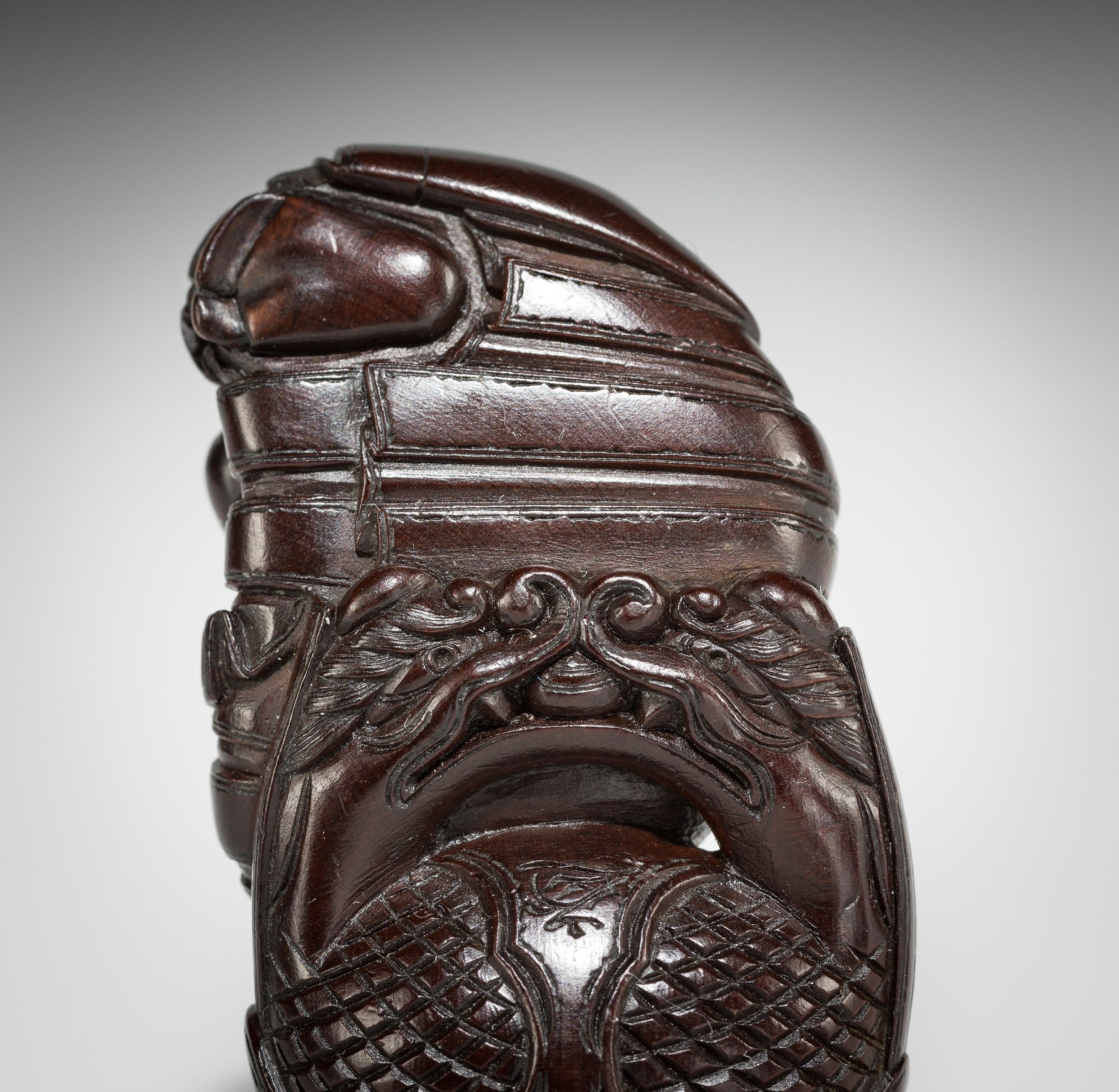 Artwork by Shûmin, SHUMIN: A FINE WOOD NETSUKE OF A MONK WITH MOKUGYO, Made of wood