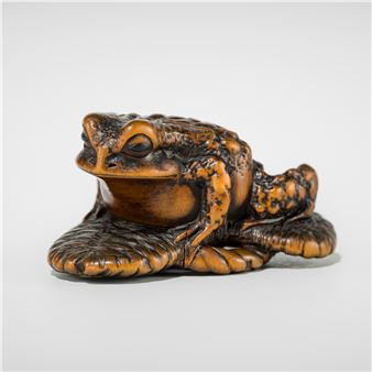 MASANAO: A WOOD NETSUKE OF A TOAD ON A WARAJI - Masanao