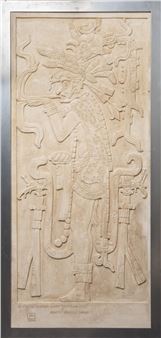 a carved sandstone panel depicting a Mayan figure, contained in a steel frame - Alvaro Pascual Gonzales