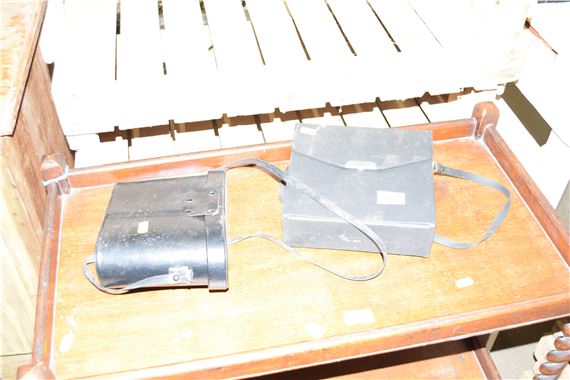 Two cased pairs of binoculars vix Super Zenith 10 x 50 and Swift Saratoga 8 x 40