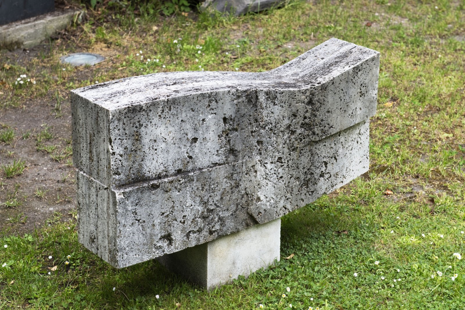 Artwork by Miroslav Vystrčil, LYING TORSO, Made of travertine, concrete