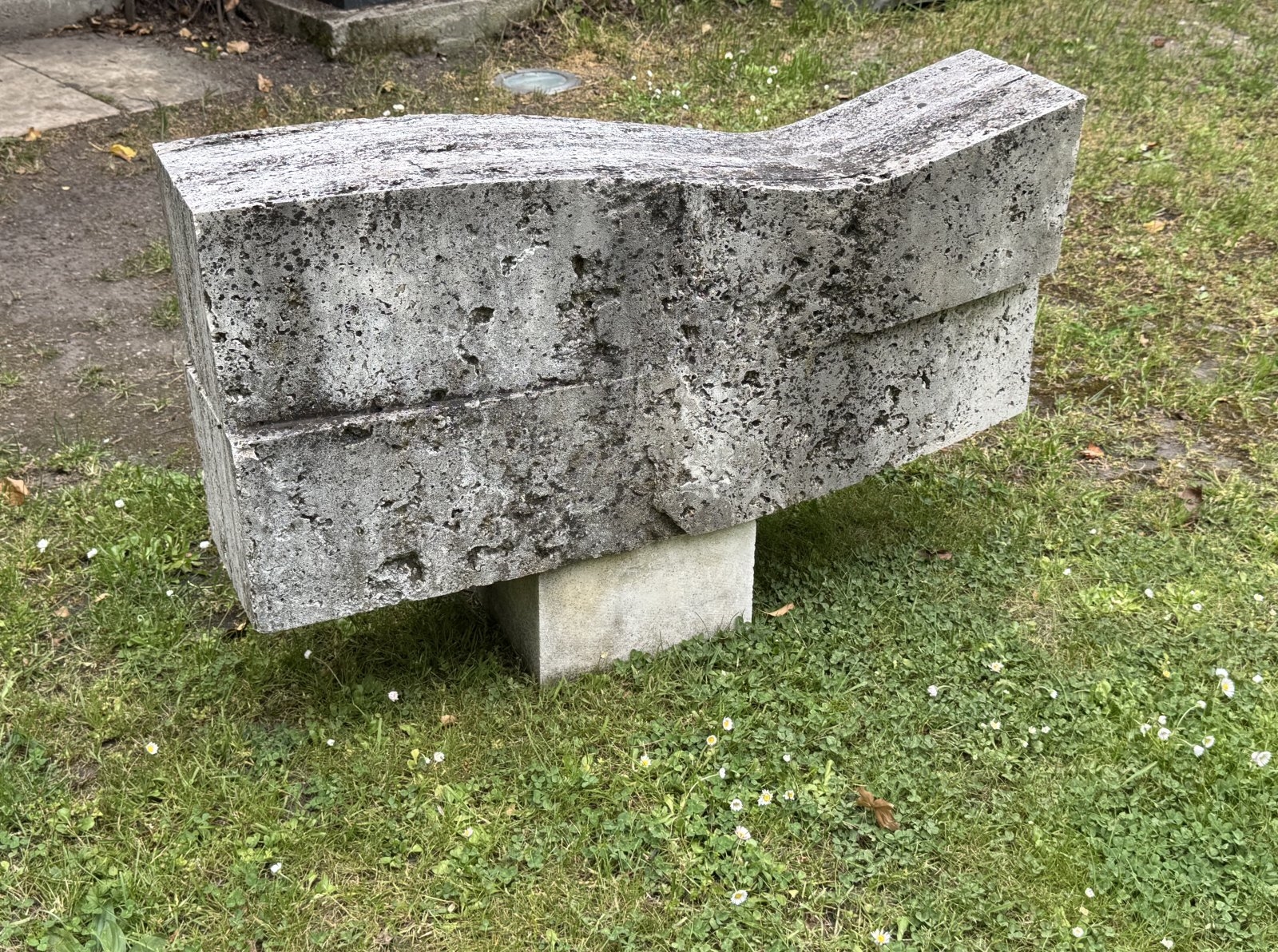 Artwork by Miroslav Vystrčil, LYING TORSO, Made of travertine, concrete