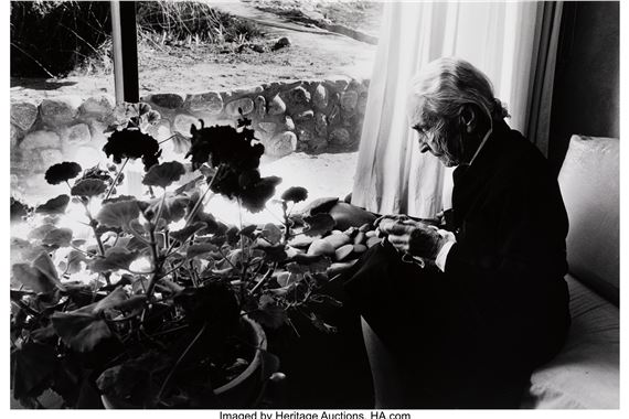 Georgia O'Keeffe Polishing Rocks, Abiquiu, New Mexico by Myron Wood, March 1980