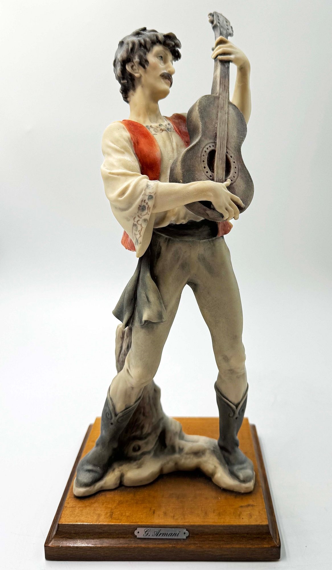 Artwork by Giuseppe Armani, A Rare Pair Of Italian Florence Capodimonte Giuseppe Armani's Gypsy Dancer & Guitarist Matt Hand Painted Porcelain Statues on Wooden bases. Signed by artist, Made of hand painted porcelain