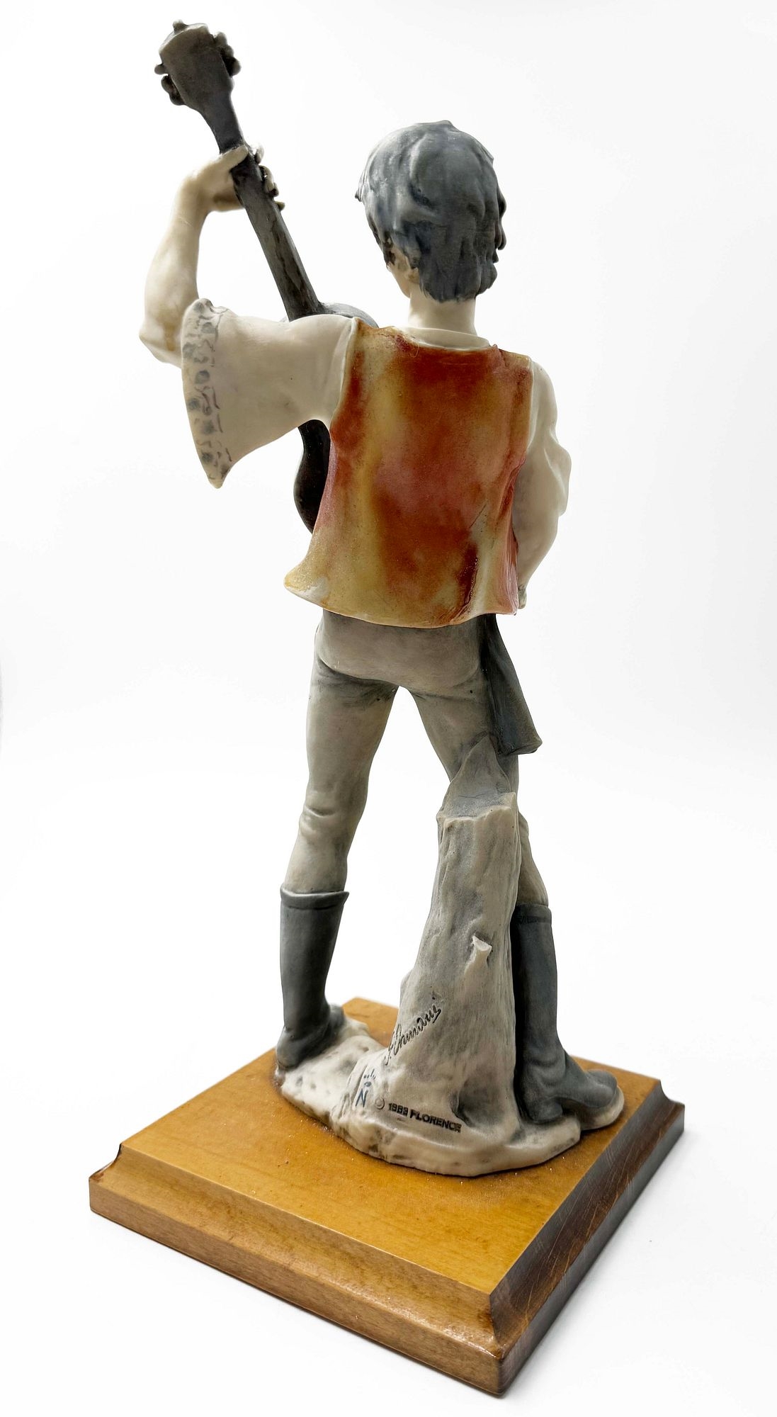 Artwork by Giuseppe Armani, A Rare Pair Of Italian Florence Capodimonte Giuseppe Armani's Gypsy Dancer & Guitarist Matt Hand Painted Porcelain Statues on Wooden bases. Signed by artist, Made of hand painted porcelain