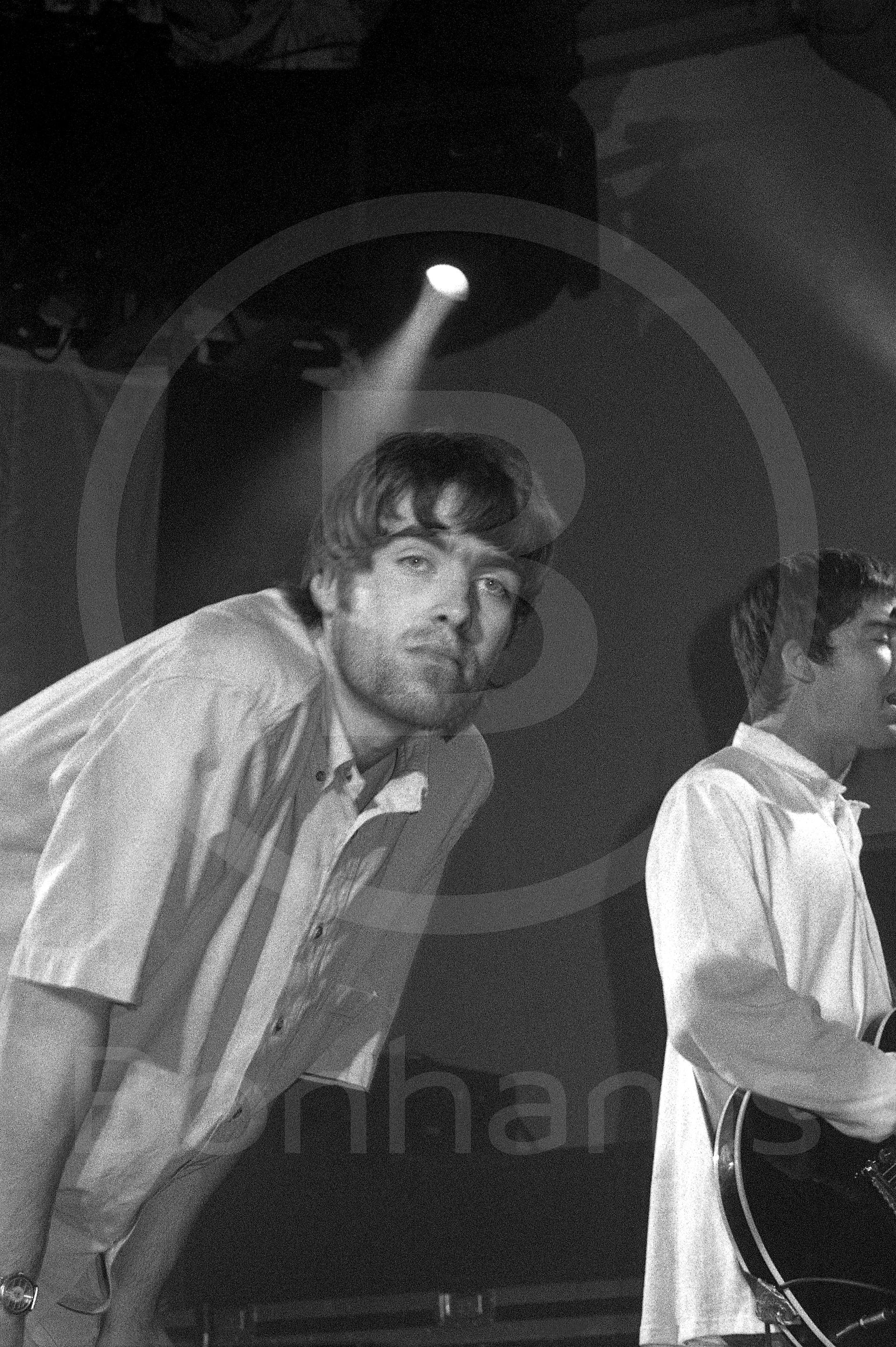Artwork by Tom Sheehan, Oasis performing at Bath Pavilion, Made of Photographs - Black and white negatives (115); Colour transparencies  (50)